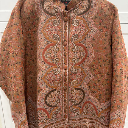 Kani Jamawar women's short winter jacket, rust paisley, front view on hanger