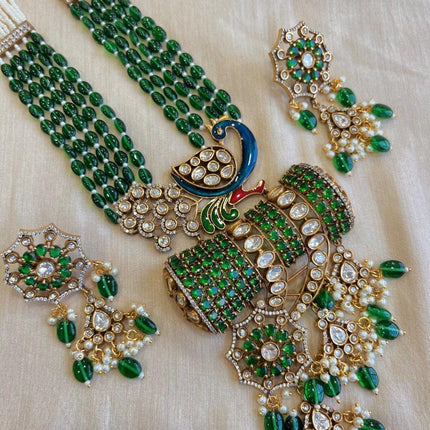 Diamonds/Semi precious beads/Pachi Kundan/Pearls/Gold finish/ Designer set/ wedding collection