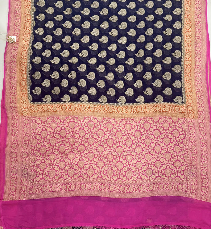 Banarasi Khaddi Georgette 3-D pattern Deep Bant Blue with Pink & orange border Saree with beautiful Zari Buttas
