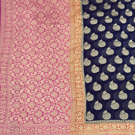 Banarasi Khaddi Georgette 3-D pattern Deep Bant Blue with Pink & orange border Saree with beautiful Zari Buttas