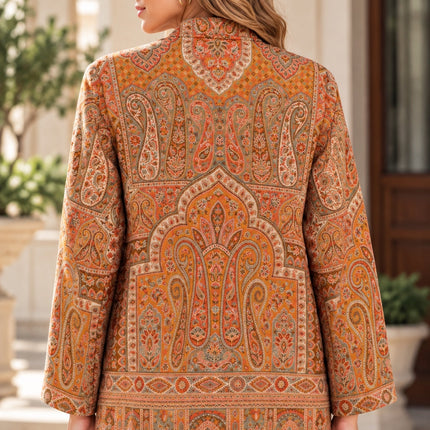 Kani Jamawar women's short winter jacket, orange paisley, back view on model