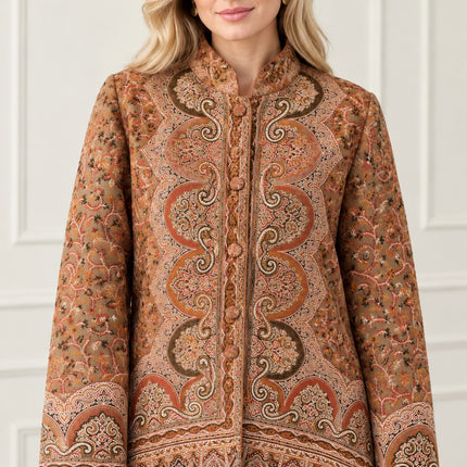Kani Jamawar women's short winter jacket, rust paisley, front view on model