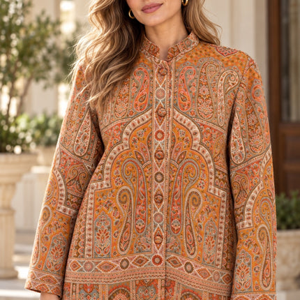 Kani Jamawar women's short winter jacket, orange paisley, front view on model